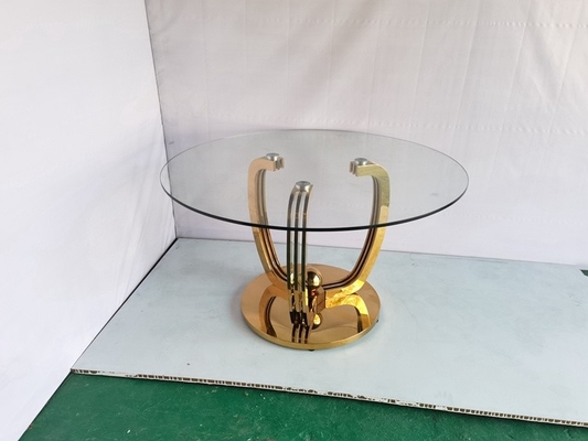 Mesa de comedor baja de acero inoxidable del oro minimalista con el top de cristal