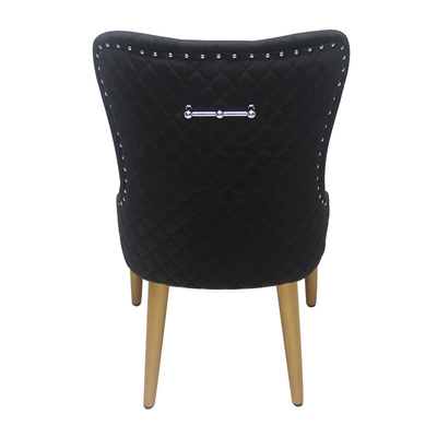Silla de terciopelo con hebilla de botón negro silla de comedor modelo elegante
