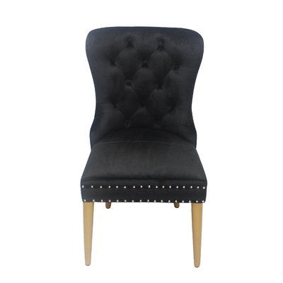 Silla de terciopelo con hebilla de botón negro silla de comedor modelo elegante
