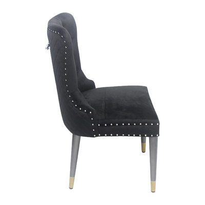 Silla de terciopelo con hebilla de botón negro silla de comedor modelo elegante