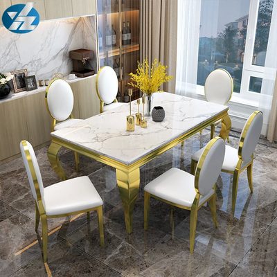 Reverso tapizado sin brazos sillas de comedor de mármol con base de acero inoxidable de plata