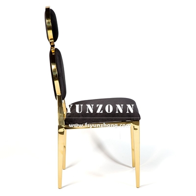 Elegancias sillas de banquete tapizadas de terciopelo con detalles dorados