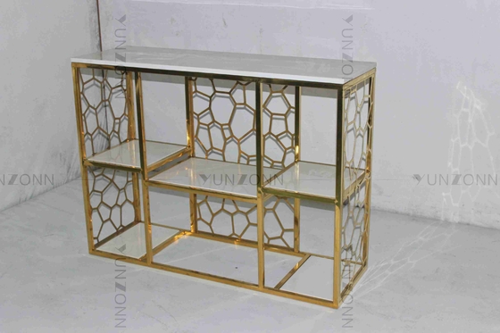 El modelo hueco de la salida que talla los gabinetes de almacenamiento del diseño vetea la estantería plateada oro
