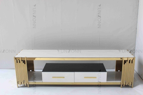 El blanco de la sala de estar y la tabla de consola del oro TV vetean el acero inoxidable superior con los cajones