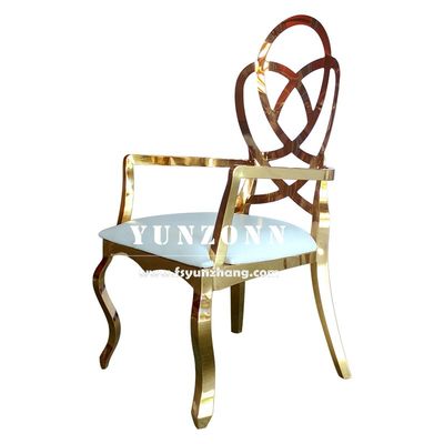 Buen precio Muebles de boda de lujo Rosas talladas en la espalda Hotel silla de restaurante de oro silla de banquete de acero inoxidable en línea