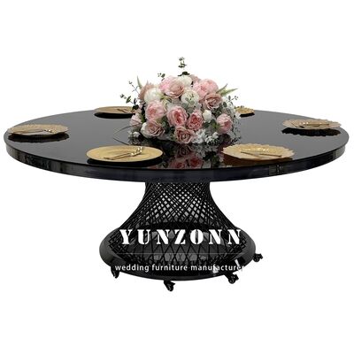 Buen precio Hotel Banquete Mesa de comedor de vidrio de techo negro de acero inoxidable Mesa de boda de metal redondo móvil en línea