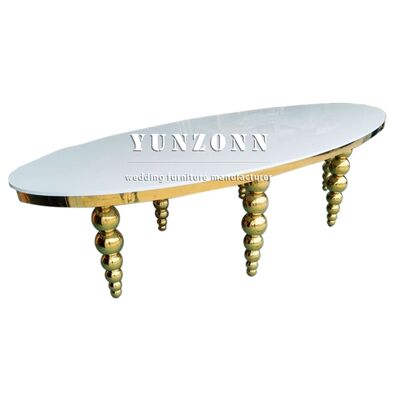 Buen precio MDF de diseño blanco Piernas de acero inoxidable Muebles de boda Mesa oval para evento de fiesta en línea
