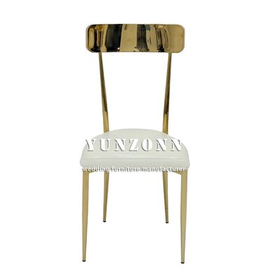 Buen precio Sillas de banquete apilables de cuero blanco y metal dorado para eventos contemporáneos en línea
