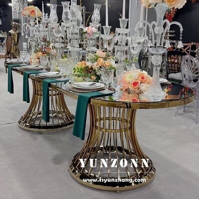 Buen precio Mesa de comedor de vidrio de acero inoxidable dorado de lujo para uso en hotel, elegante mueble para eventos en línea