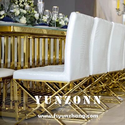 Buen precio Silla de comedor de lujo moderna de cuero PU blanco con patas de metal y diseño de pespuntes cruzados para estilo de ocio en el hogar o hotel en línea