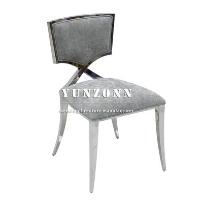Buen precio Silla de banquete de hotel de diseño especial, silla de comedor para fiestas de acero inoxidable, silla para eventos con marco plateado en línea