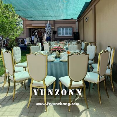 Buen precio Nueva cabeza de gato marco de acero inoxidable hotel sillas de boda muebles suministros silla de eventos de cuero blanco eventos de oro banquete en línea