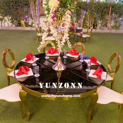 Buen precio Mesa de comedor moderna de acero inoxidable de lujo con tapa de vidrio para bodas al aire libre Hotel fiesta Banquete diseño redondo en línea