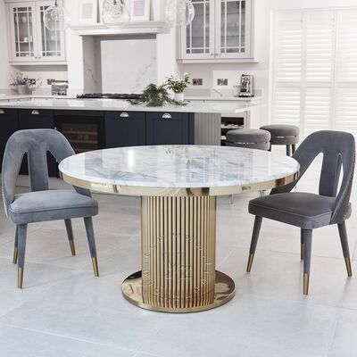 Buen precio Mesa de comedor moderna de acero inoxidable dorado con pedestal circular de mármol, mueble elegante y contemporáneo para hogar, villa, hotel y bodas en línea