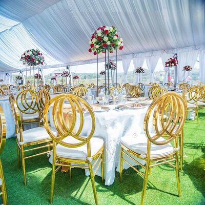 Buen precio Silla de comedor moderna de acero inoxidable para apartamentos Hoteles Eventos de bodas Salón al aire libre Cocina Uso al por mayor Muebles de metal en línea