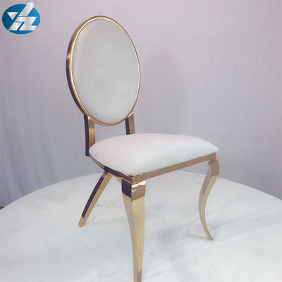 Buen precio Silla blanca elegante del banquete del terciopelo que se casa de la silla de las piernas traseras cruzadas de Chrome en línea